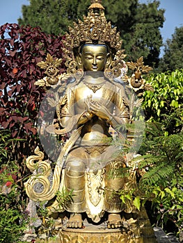 Close-up of statue of PrajÃÂ±ÃÂpÃÂramitÃÂ Bodhisattva, personification of transcendent wisdom, at Kopan Monastery, Kathmandu, Nepal photo